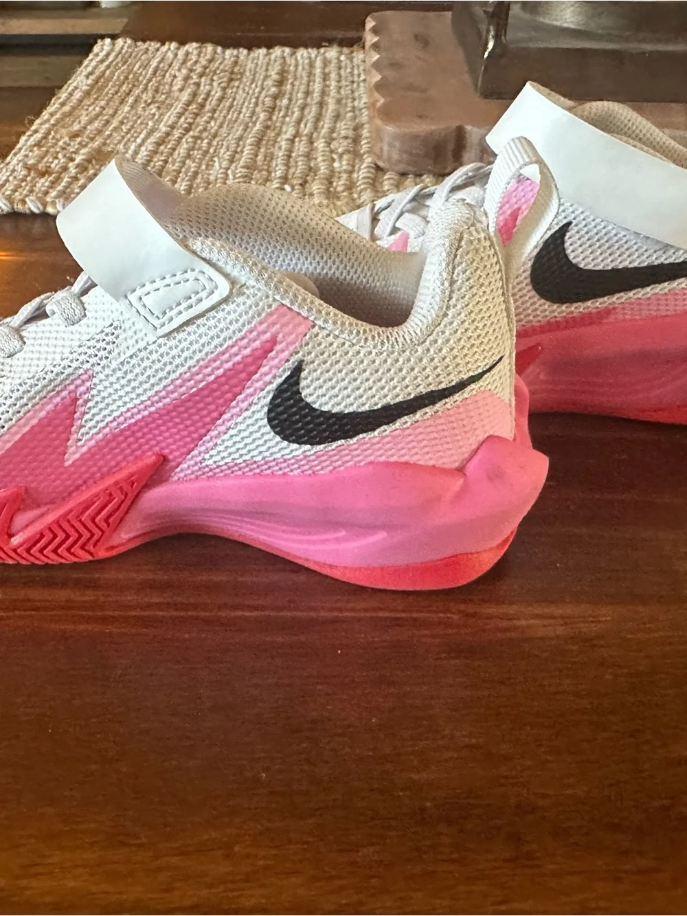 Nike Kids White Sneakers with Pink and Hot Pink Accents and Black Swoosh